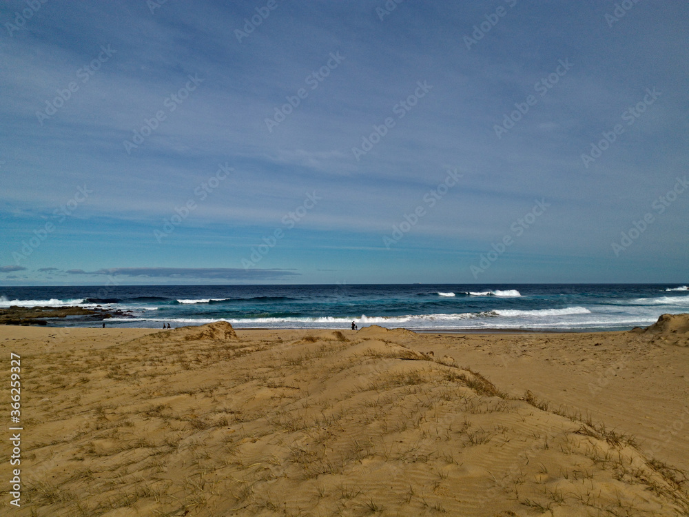 Beautiful view of a sandy beach with ocean wave, Marley Beach, Royal National Park, Sydney, Australia Beautiful view of a sandy beach with ocean wave, Marley Beach, Royal National Park, Sydney, Australia