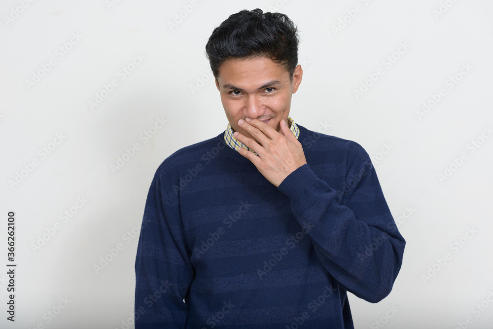 Portrait of handsome Asian man with sweater Portrait of handsome Asian man with sweater