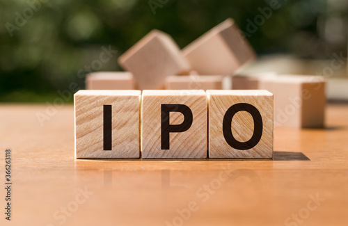 IPO - acronym from wooden blocks with letters, Initial Public Offering IPO concept
