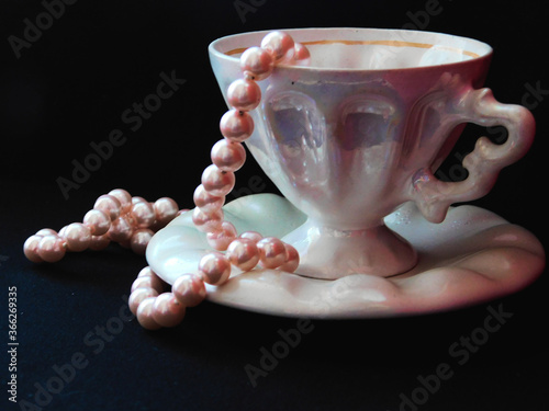 pearl necklace on black background
