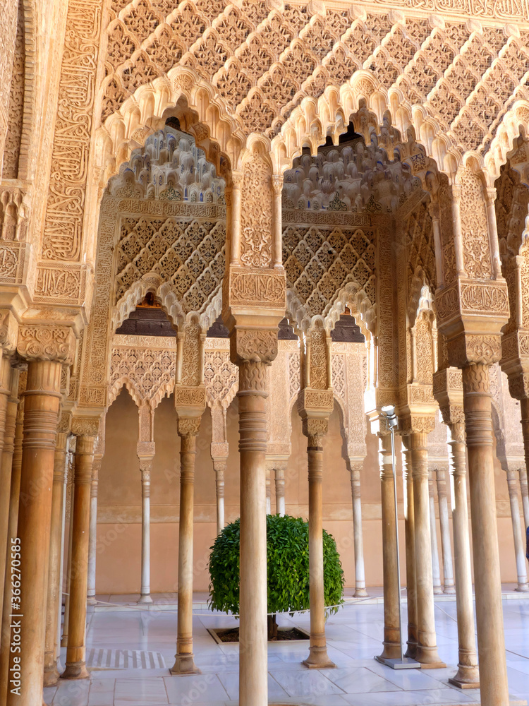 Nasrid architecture at the Palace of the Lions in the Alhambra complex overlooking Granada in Andalusia, southern Spain. Nasrid architecture at the Palace of the Lions in the Alhambra complex overlooking Granada in Andalusia, southern Spain.
