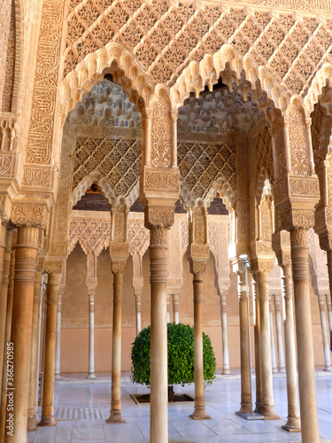 Nasrid architecture at the Palace of the Lions in the Alhambra complex overlooking Granada in Andalusia, southern Spain.