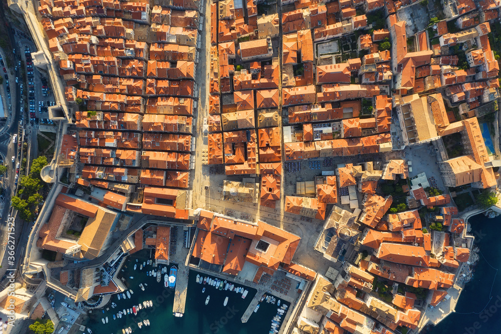 Dubrovnik, Croatia. Aerial view on the old town. Vacation and adventure. Town and sea. Top view from drone on the old castle and blue sea. Dubrovnik, Croatia. Aerial view on the old town. Vacation and adventure. Town and sea. Top view from drone on the old castle and blue sea.