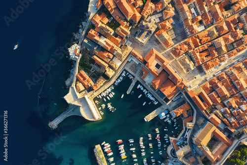 Dubrovnik, Croatia. Aerial view on the old town. Vacation and adventure. Town and sea. Top view from drone on the old castle and blue sea.