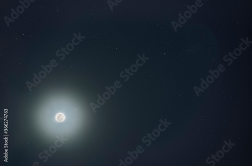 Moon halo and stars