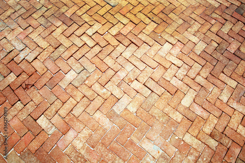 Ancient of pattern light tone brick floor pavement stones