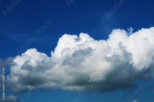 beautiful heap dark blue sky white cloud in the autumn and sunlight