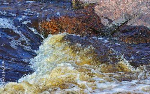 water flowing over rocks