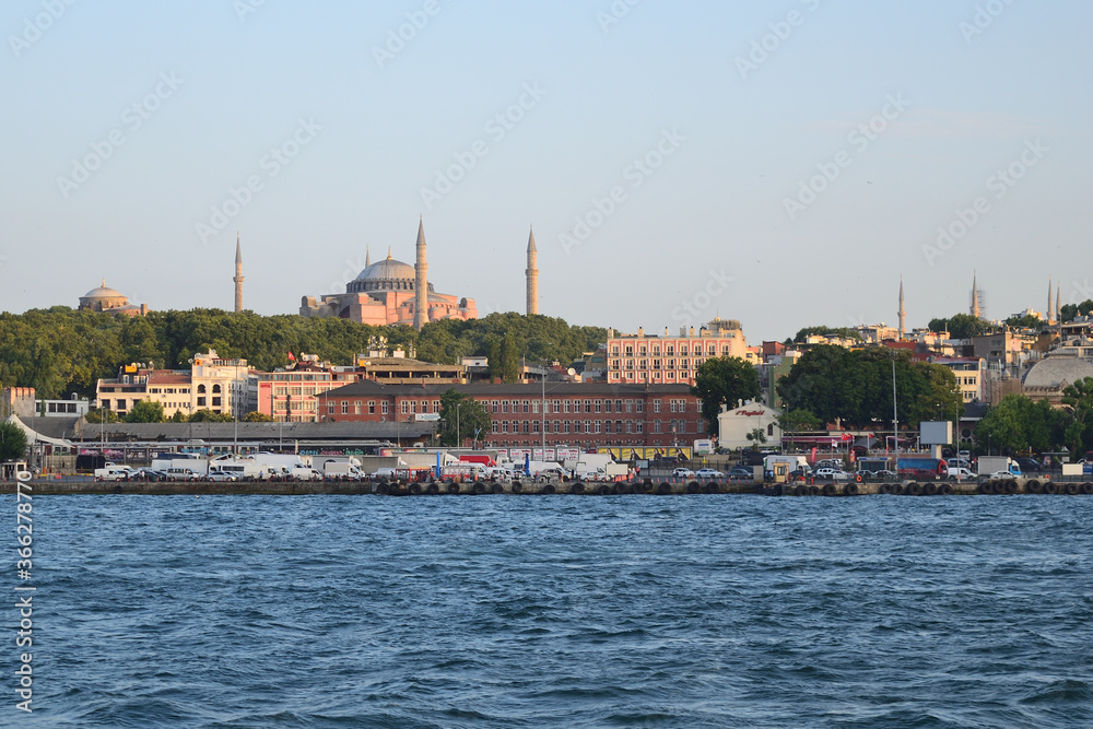Hagia Sophia (Aya Sophia), Christian greek-orthodox patriarchal basilica, imperial mosque and museum, Istanbul, Turkey - view from Golden Horn to the Eminonu ferry quay. 