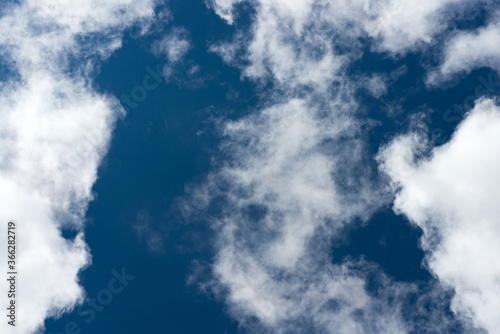 Obraz na płótnie Cumulus clouds in the blue sky during the day in Sunny weather w salonie