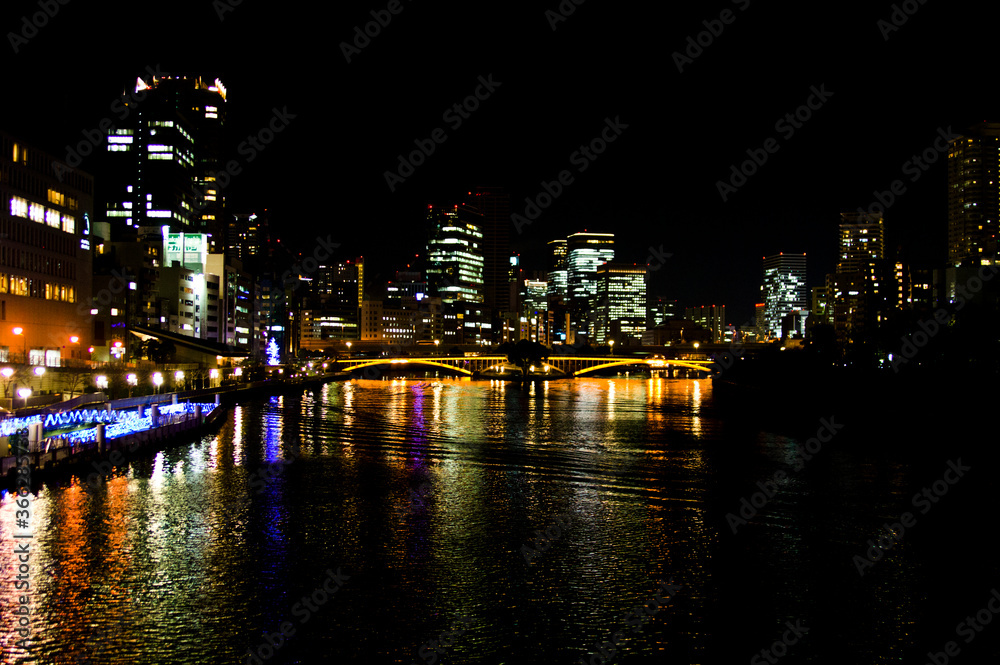 A night view of the Tenmabashi area in Osaka, Japan.