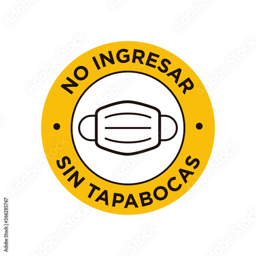 No entry without face mask written in Spanish icon. Round and yellow symbol about mandatory use of face mask to prevent Coronavirus.