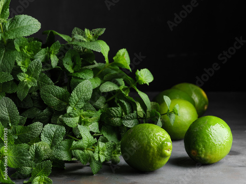 Lime and peppermint on a dark background.