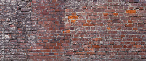 Fotografie background of old red brick wall. Texture of grunge brickwork
