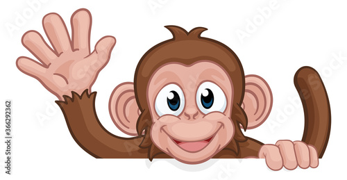 A monkey cartoon character animal peeking over a sign and waving