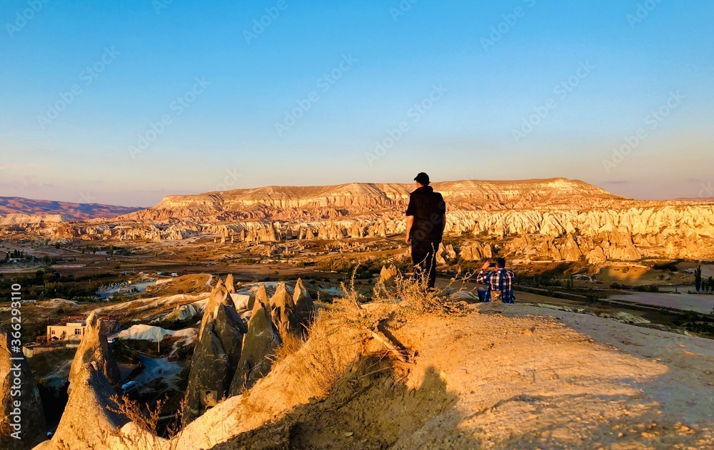 Naklejka premium silhouette of a man walking in the mountains