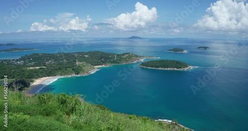 aerial view from mountain on pha hin dam to see nai harn beach and promtep cape photo