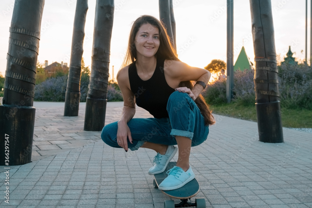 beautiful young woman with skateboard summer portrait beautiful young woman with skateboard summer portrait