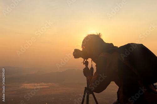 photographers capturing sunrise.