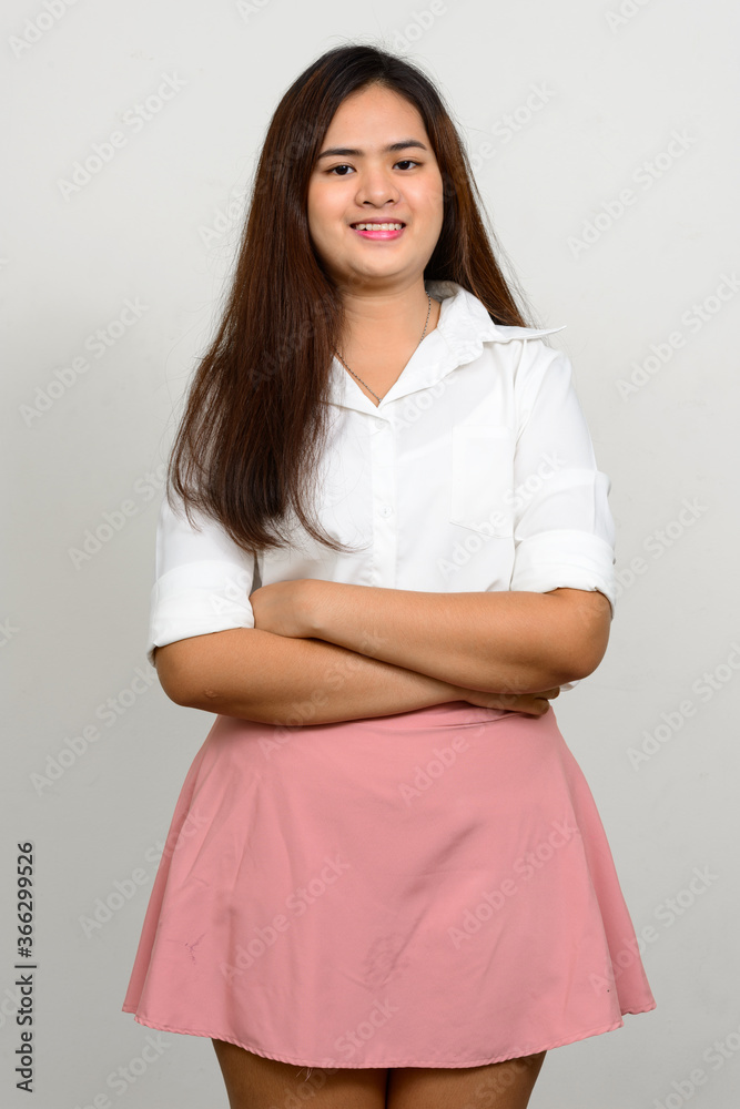 Portrait of happy young beautiful Asian woman Portrait of happy young beautiful Asian woman