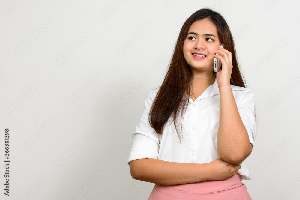 Portrait of happy young beautiful Asian woman Portrait of happy young beautiful Asian woman