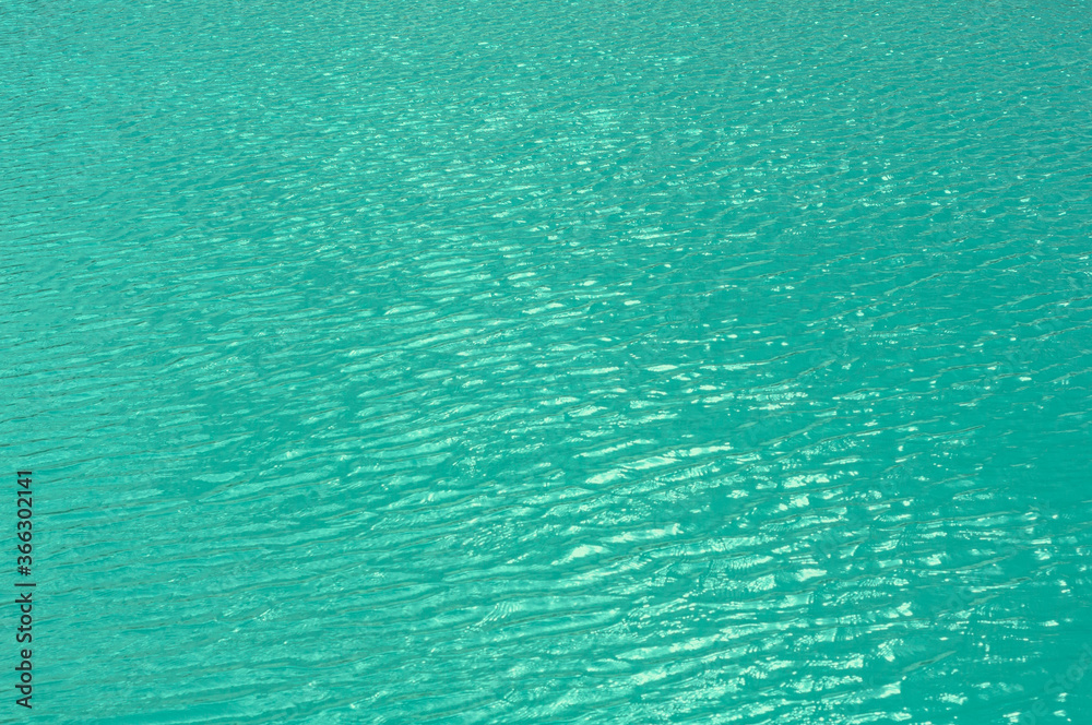 Bright, colorful background close up, turquoise green water surface lake, outdoors. Bright, colorful background close up, turquoise green water surface lake, outdoors.