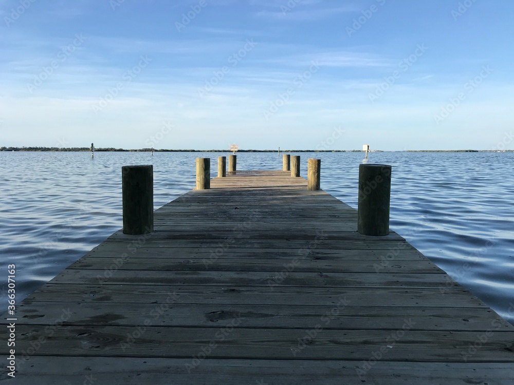 Obraz premium Small Pier on River in Cocoa Beach Florida Fishing . Photo image