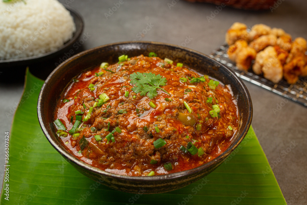 Ong chili paste in a mortar Decorated with beautiful side dishes. Ong chili paste in a mortar Decorated with beautiful side dishes.