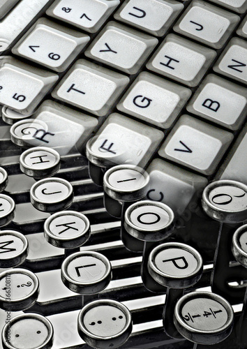 montage of old typewriter keys and computer keyboard