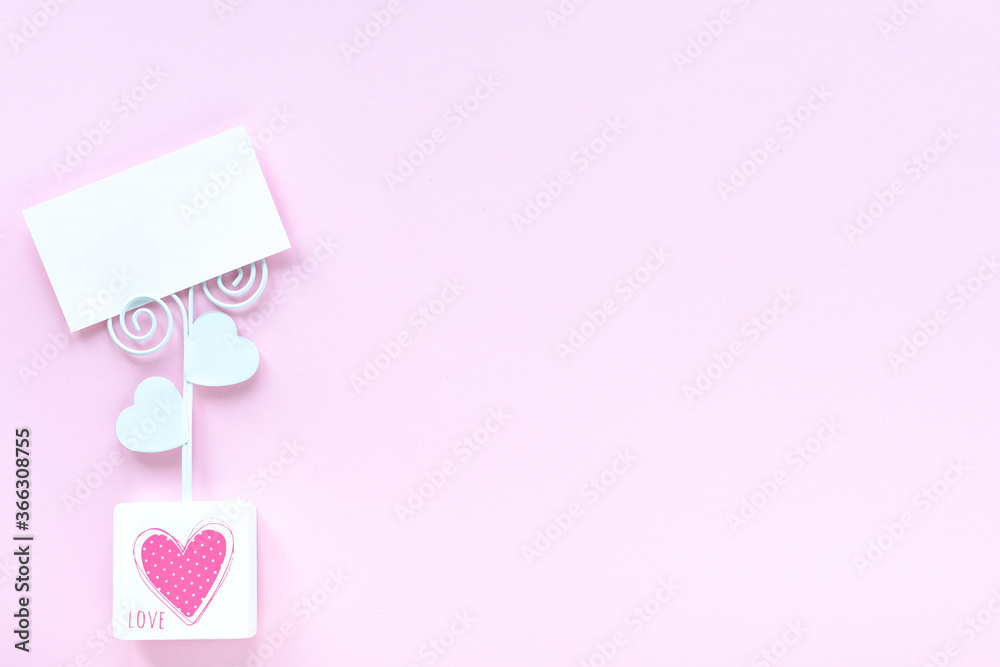 Business card mockup on pink background with copy space.