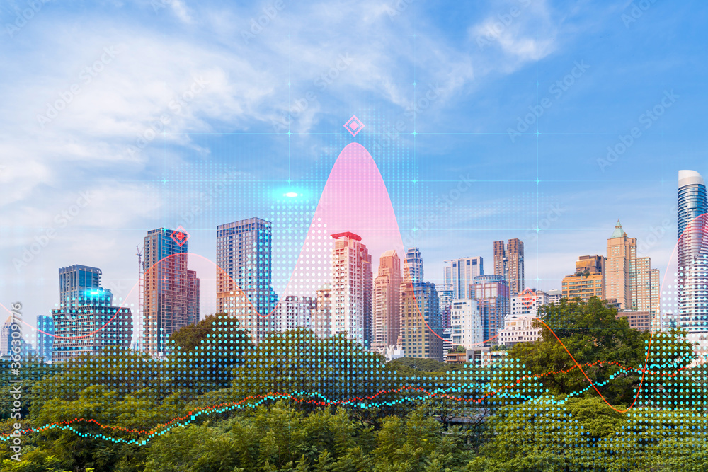 Obraz premium Forex and stock market chart hologram over panorama city view of Bangkok, the financial center in Asia. The concept of international trading. Double exposure.