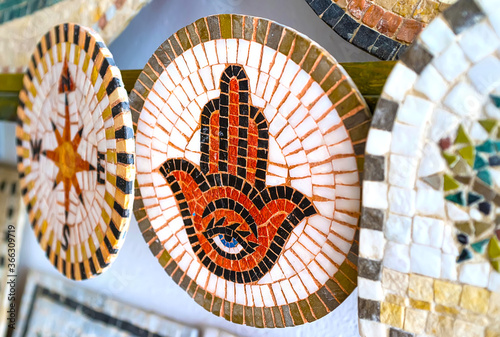 The Hamsa amulet, made of stone mosaic, Sousse handicraft market, Tunisia photo
