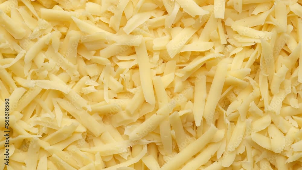 grated cheese rotating top view grated cheese rotating top view