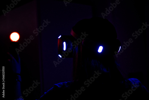 Girl wearing VR headset and playing games