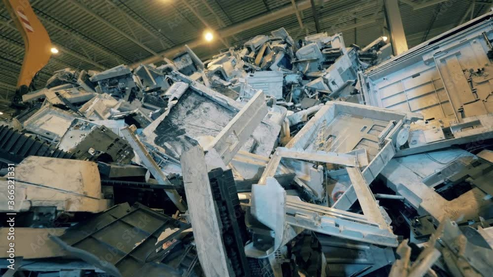Heap of metal and plastic trash at recycling center. Heap of metal and plastic trash at recycling center.