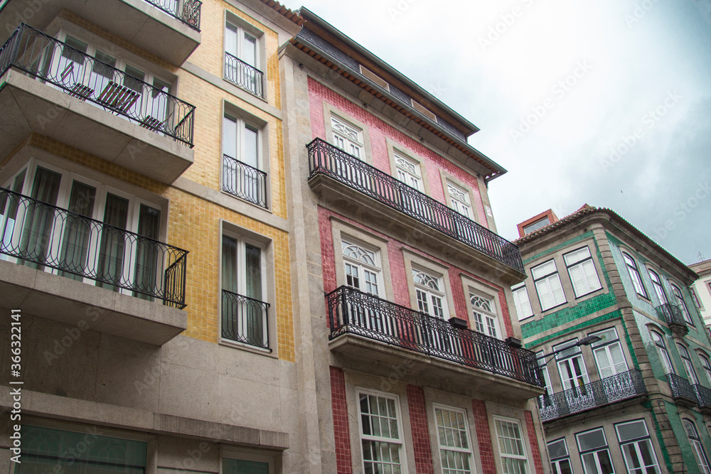 Fototapeta premium Typical residential building facades with colorful tiles wall in the city center of Porto Portugal Europe