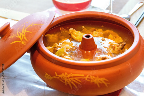 Food specialty China: Air-Pot Chicken or Steam Pot Chicken. The chicken was steamed in a pot with a hole receive vaporized water from the steam outside of the pot in order to get a intensified flavor.