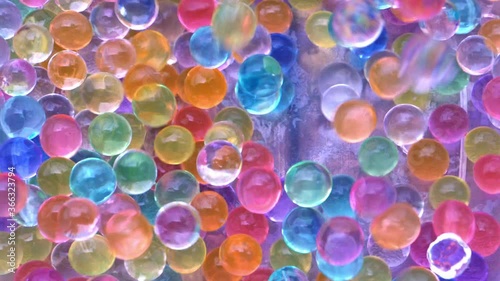 Fun colorful gel-like beads in motion