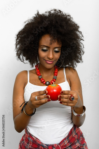 Portrait of young beautiful African woman with Afro hair