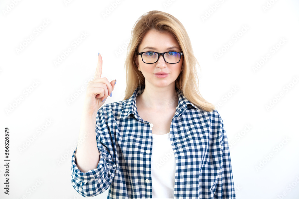 Young business woman in glasses having an idea on white background Young business woman in glasses having an idea on white background