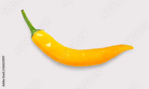 Orange or Yellow chilli on a white background