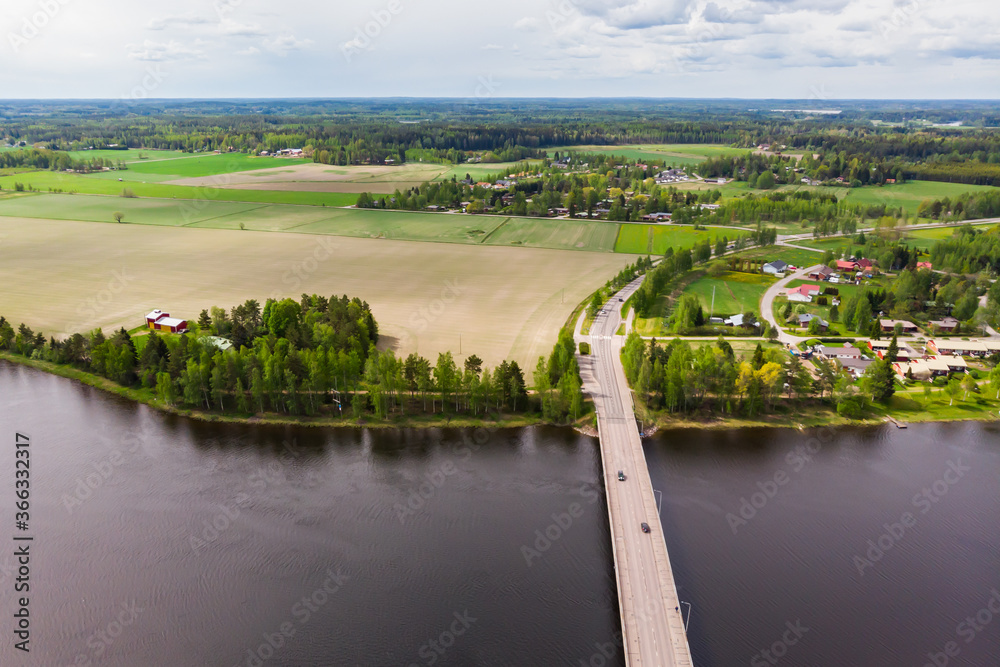 Aerial panoramic view of bridge in city Inkeroinen at river Kymijoki, Finland.