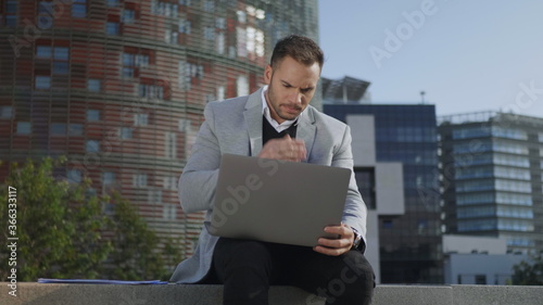 Photography Business man working on laptop in city