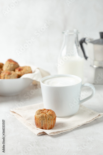 breakfast with milk and muffin