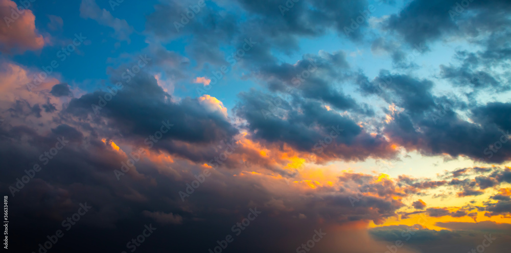 Beautiful dramatic sky. Sunset or sunrise time. Amazing purple clouds. Beautiful dramatic sky. Sunset or sunrise time. Amazing purple clouds.