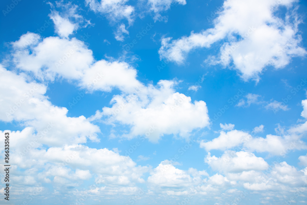 Blue sky and white clouds. Beautiful nature background. Summer vibes. Blue sky and white clouds. Beautiful nature background. Summer vibes.