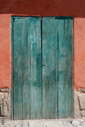 weathered wooden door © Yury Zap