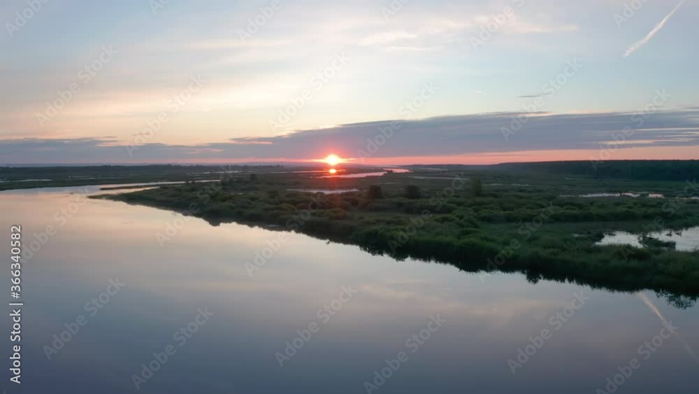 Flight over the water of Kama river in Russia at sunrise (Nizhnekamsk Reservoir) Flight over the water of Kama river in Russia at sunrise (Nizhnekamsk Reservoir)