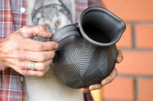 Handmade, traditional black pottery. Lithuania, Merkine photo