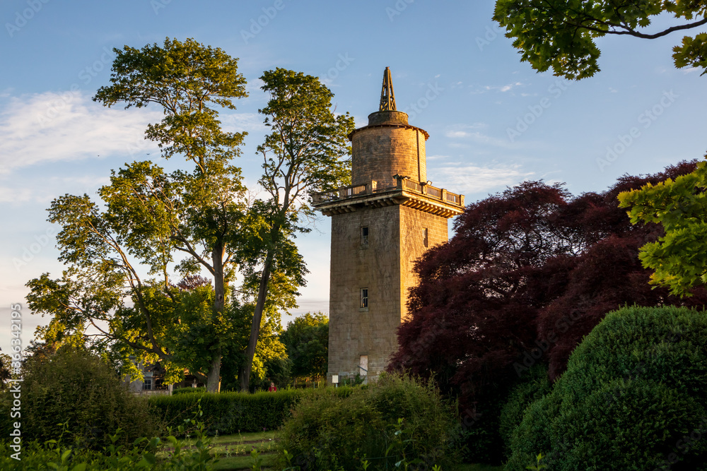 Fototapeta premium Beautiful view of the historic water tower in Harkness Memorial State Park, Connecticut, USA, on sunset